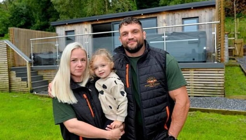 John Phillips, pictured here with his wife Kerrie Garrett and daughter Darcy, has vowed to fight the council's decision to demolish his AirBnBs